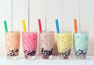 Photo of 5 cups of boba tea with colorful straws